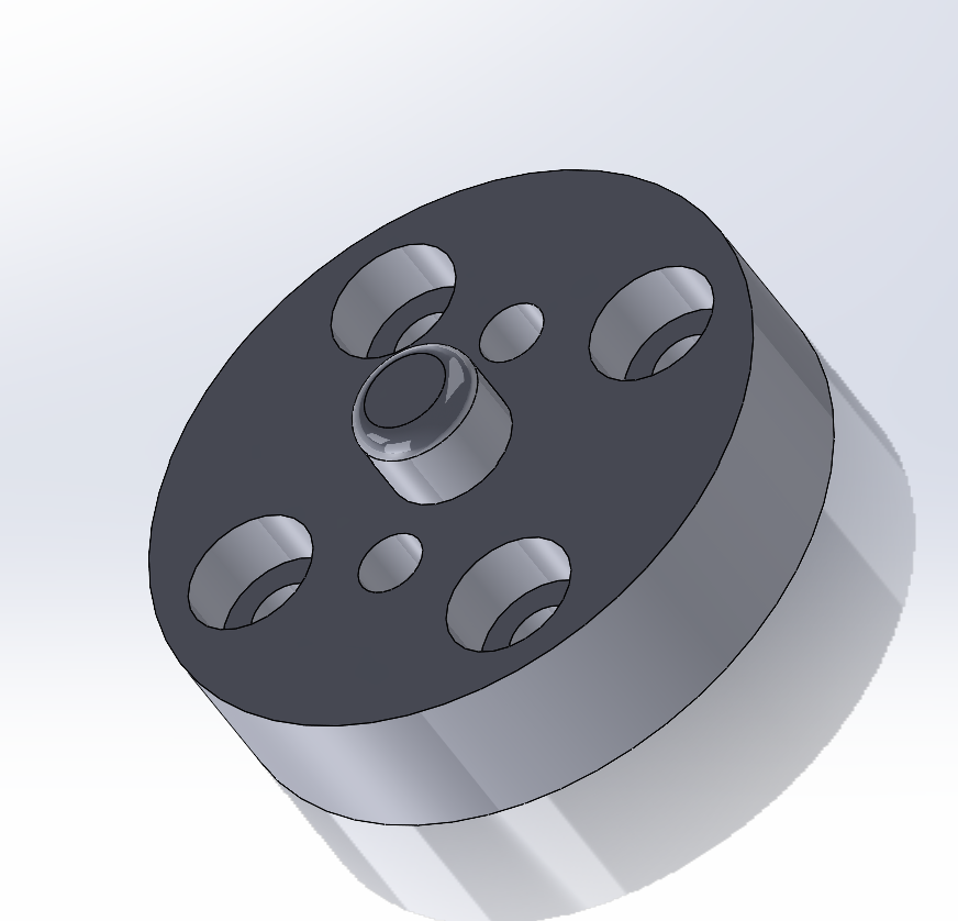 CAD render of a cylindrical motor mount with a counterbored bolt pattern and central boss